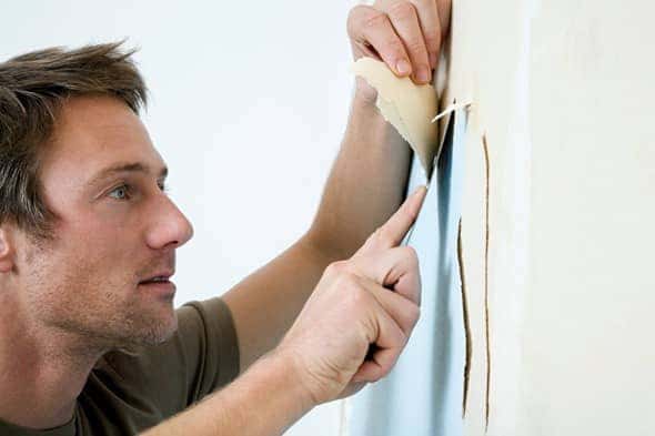 Man-Is-Removing-Wallpaper