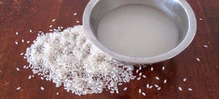 Rice on table next to bowl