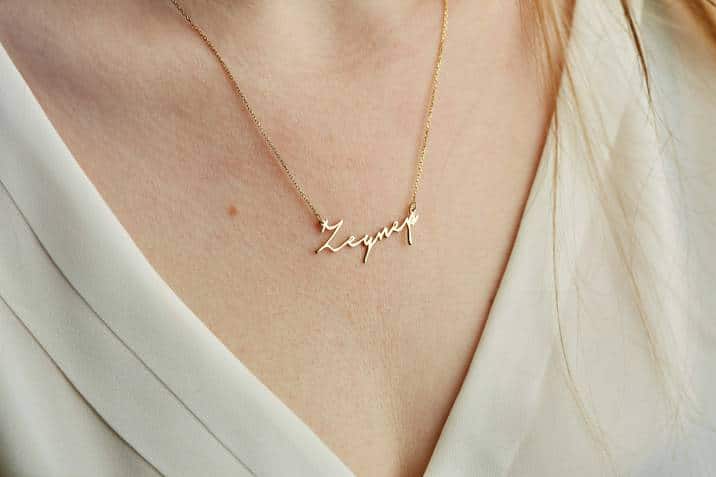 A young lady with a gold name necklace, Personalised Valentine's Day gift idea