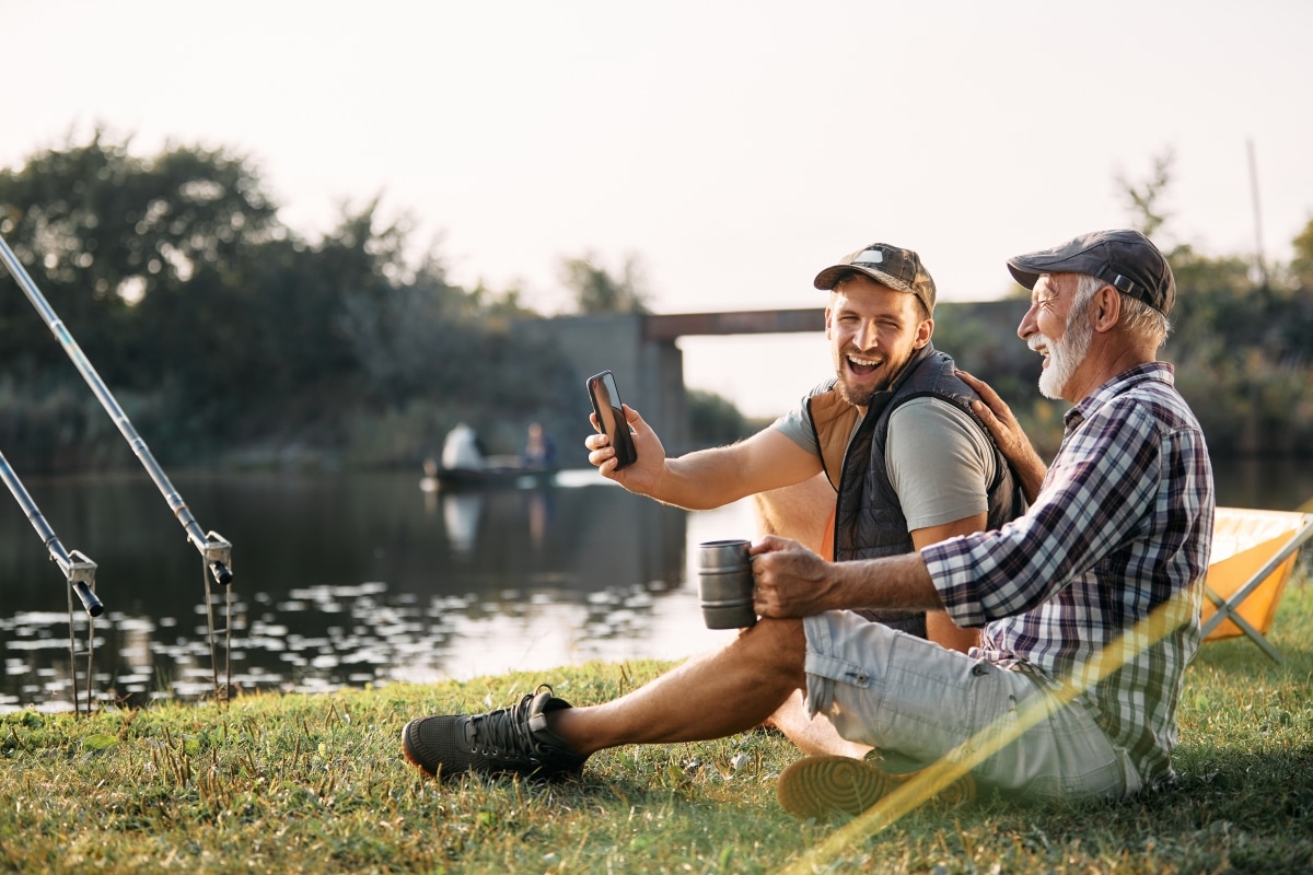 A son spending some quality time with his dad outdoors