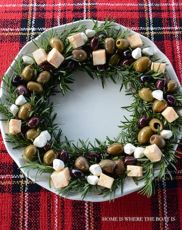 Rosemary antipasto platter with cheese and olives