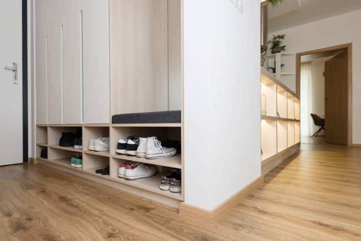 Entrance hall into contemporary apartment with furniture