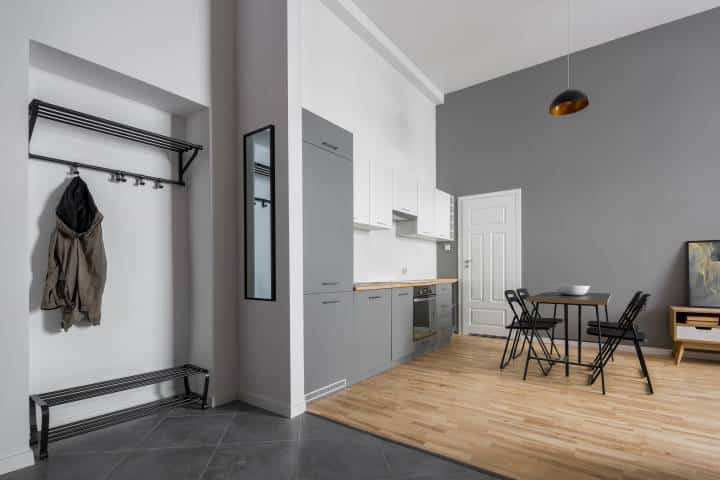 Modern apartment with floor tiles at the entryway