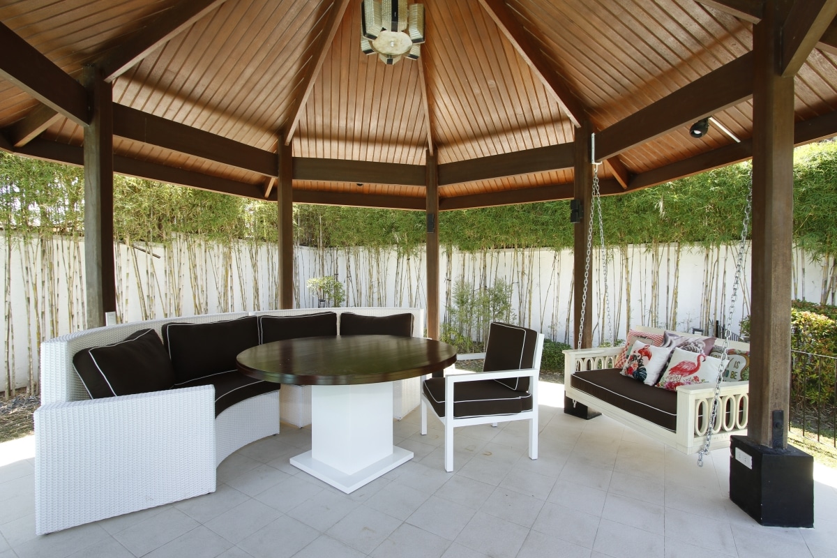 large backyard gazebo with comfortable seating