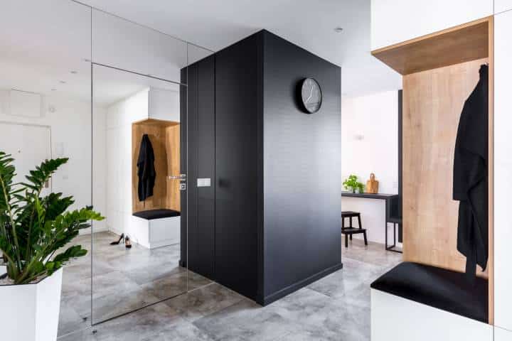 Mudroom with modern mirrored wall