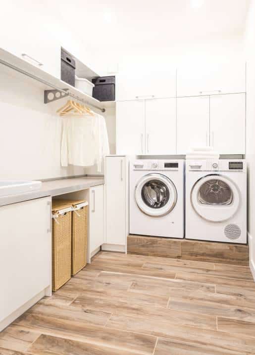 farmhouse laundry room with sink