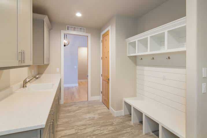 modern and rustic farm house laundry room and mudroom combined