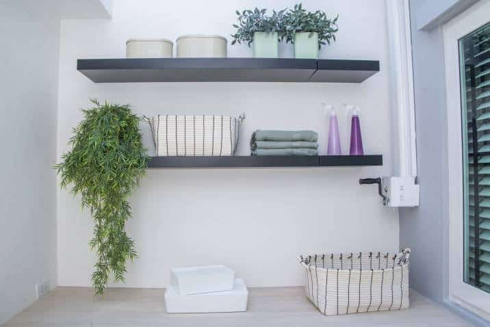 Wooden shelf in laundry room 