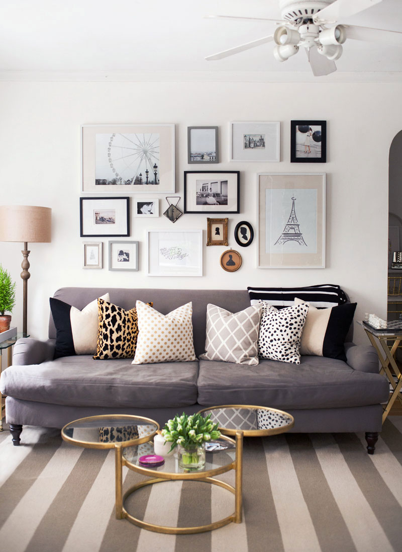 dark grey couch with pillows