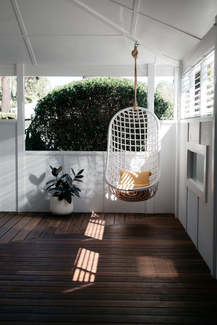 hanging chair in front porch