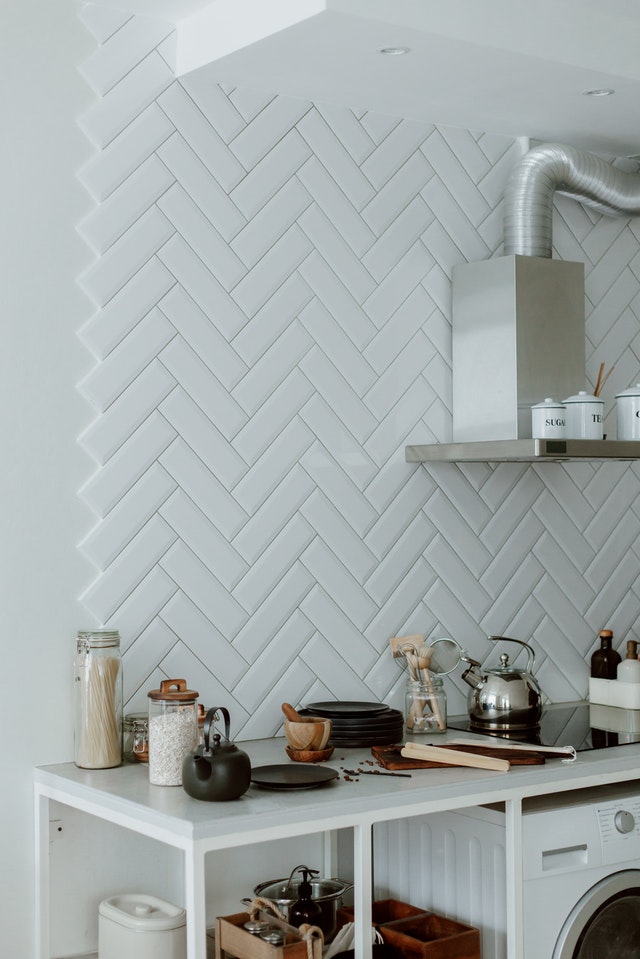 white-kitchen-with-tile-and-stainless-steel