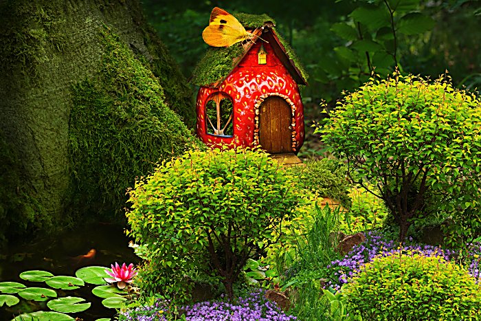 Fruit fairy house in a fantastic forest with koi pond