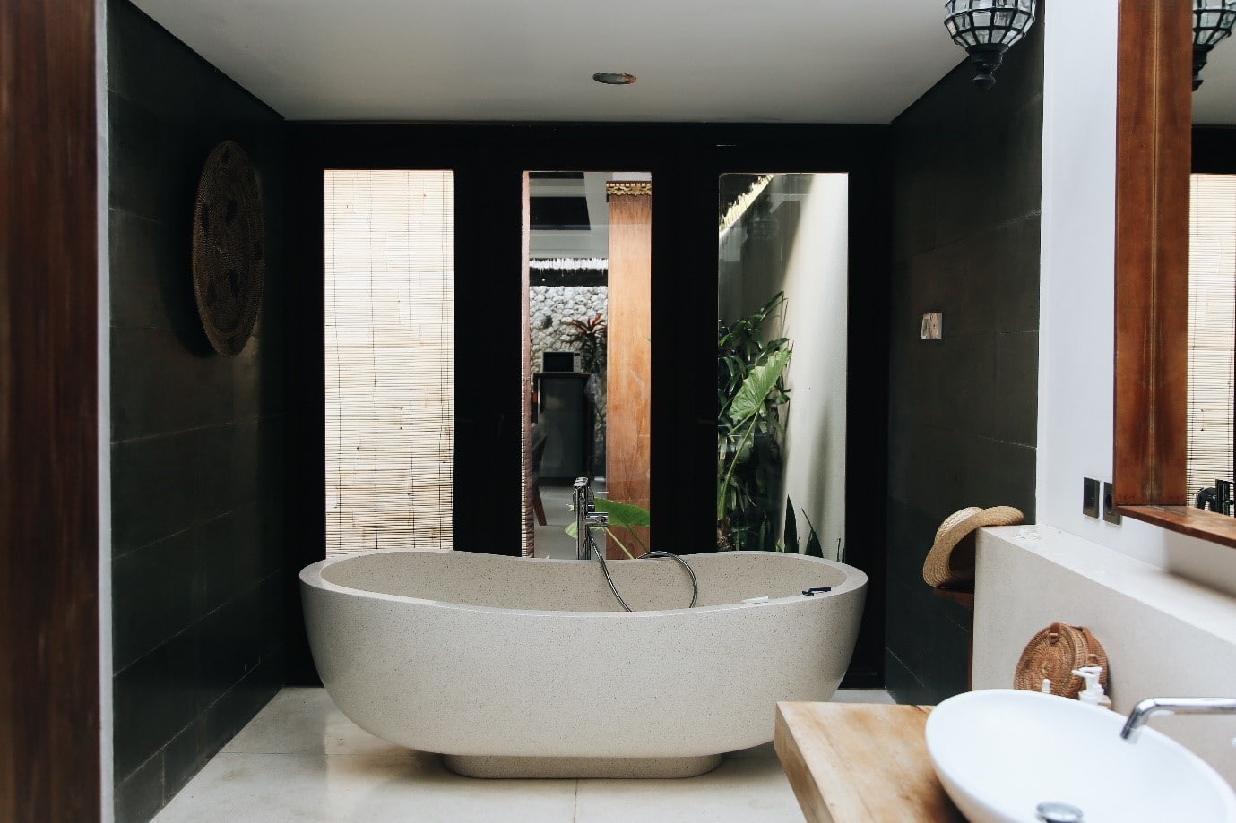 dark-bathroom-dark-walls-white-tub