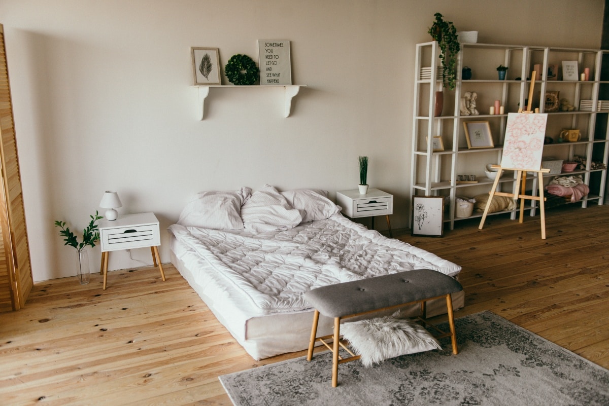 Bedroom with hanging shelves and storage