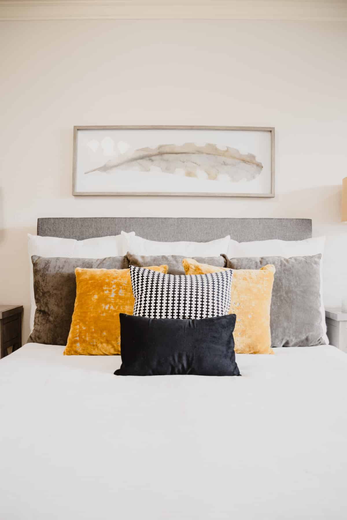Coloured cushions on the bed