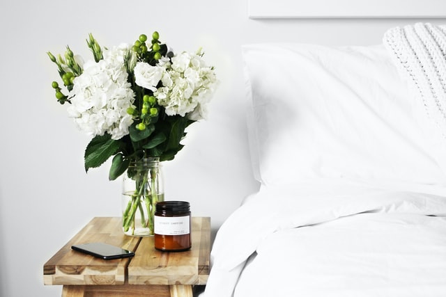 white bedroom with flowers