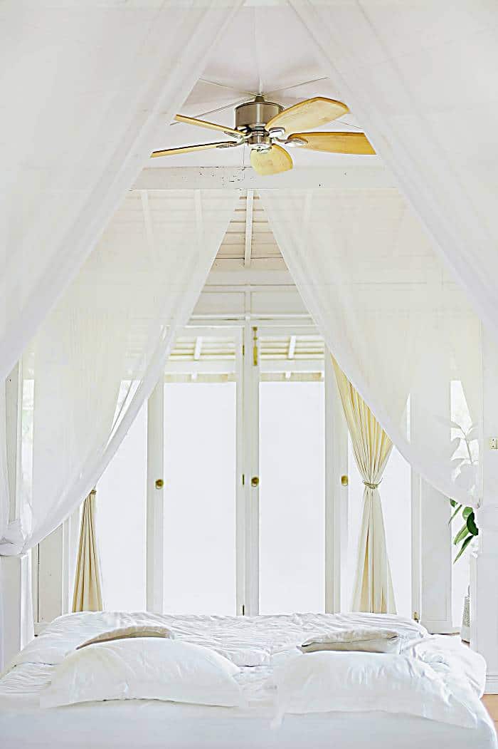 floor to ceiling white curtains