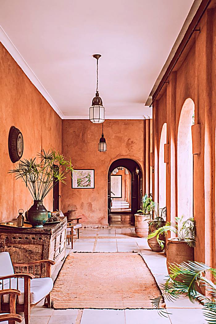 Moroccan jewel lights in orange hallway
