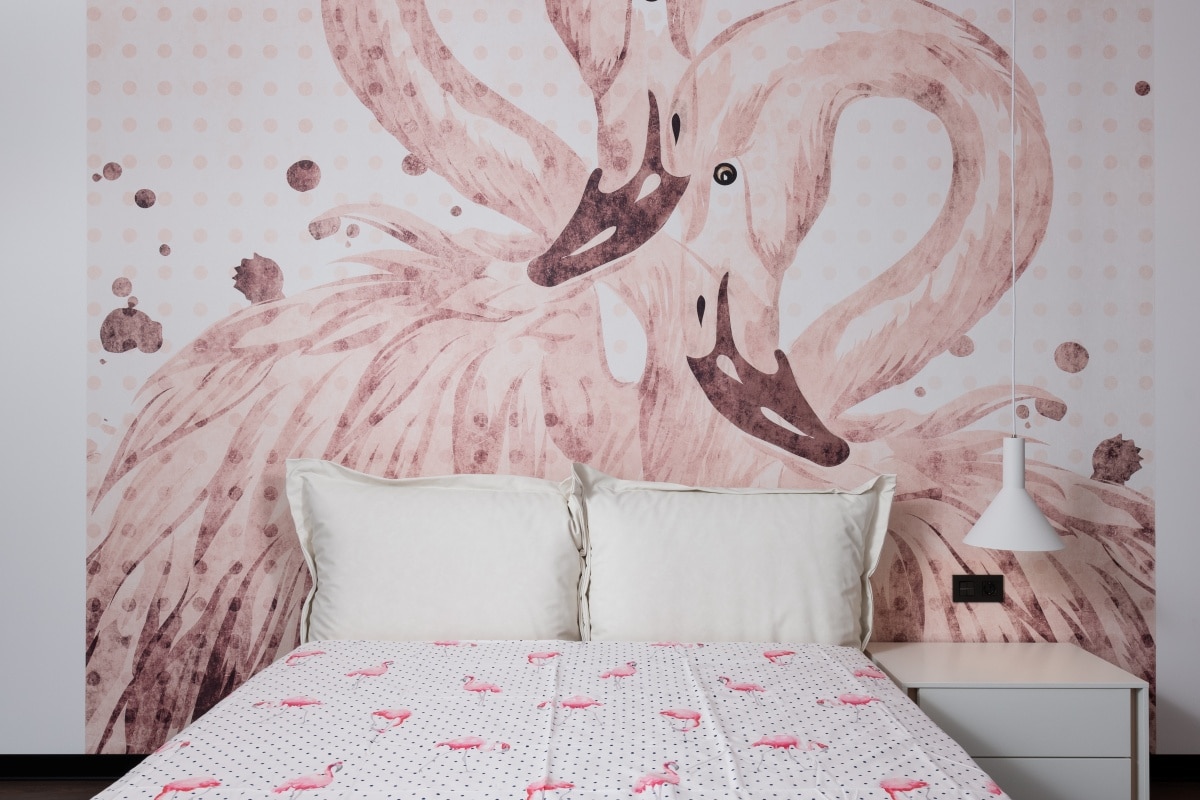 Bedroom with flamingos on wall and bed