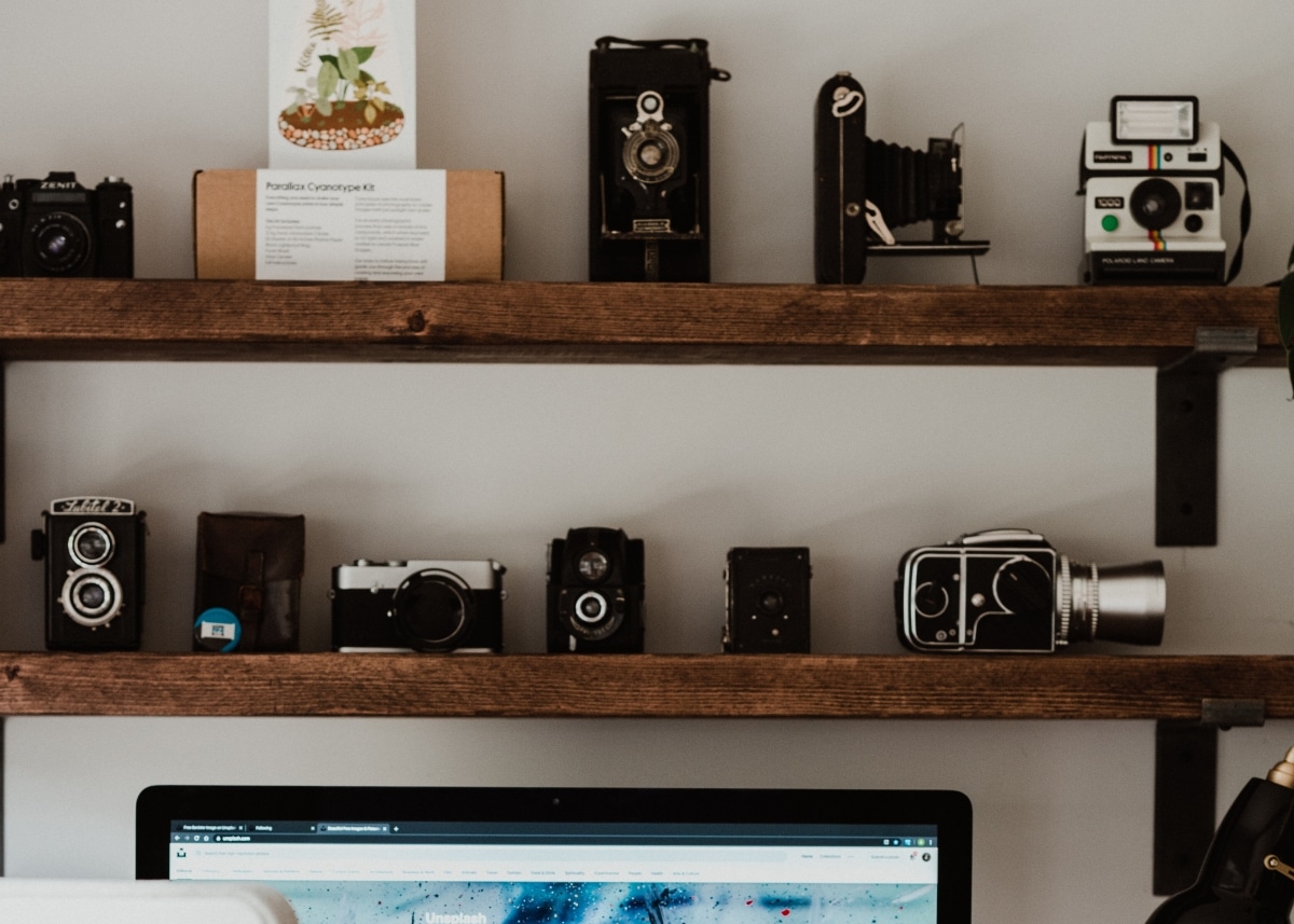 camera storage shelf over desk