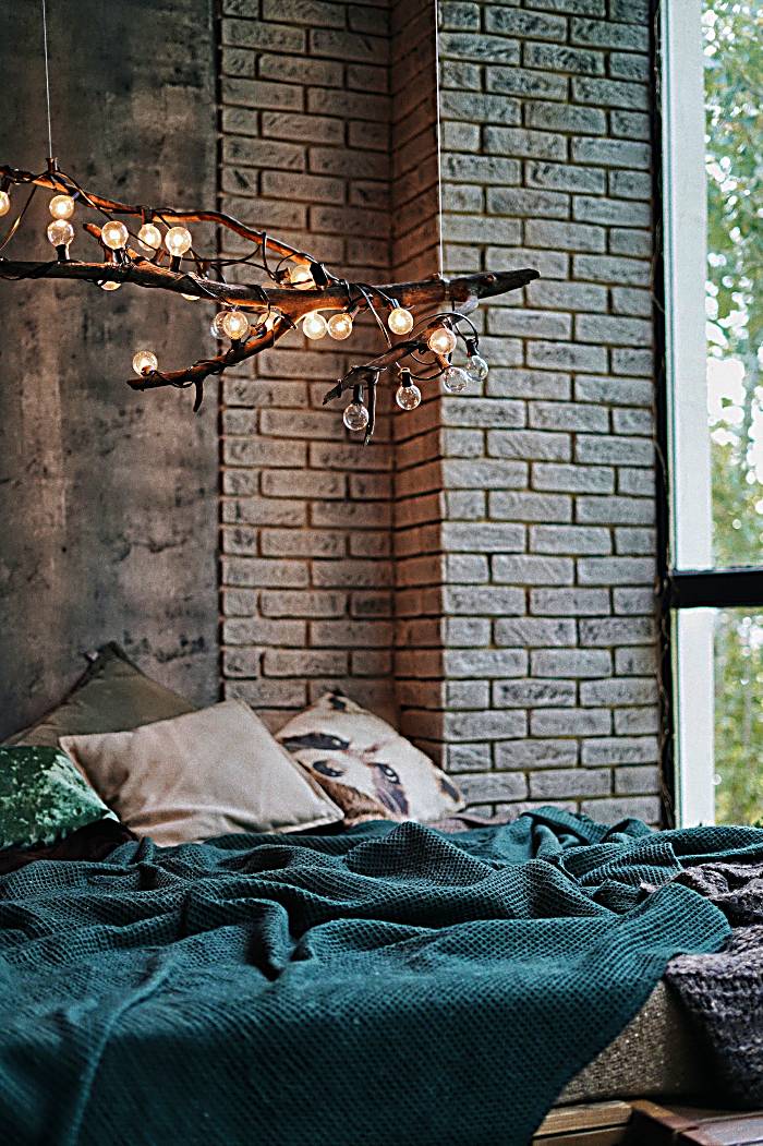 dark stone walls with hanging lights