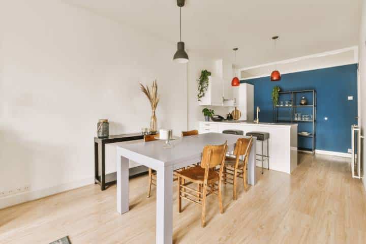 Dining area with blue accent wall