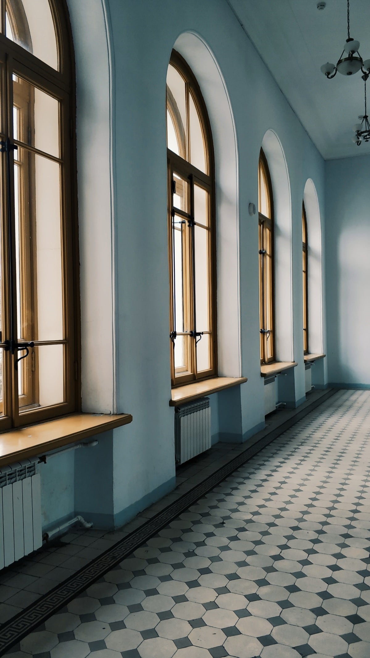 grey-hallway-tile-arches