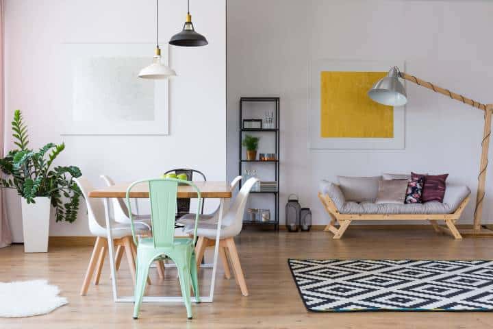 Mint and white chairs at dining table