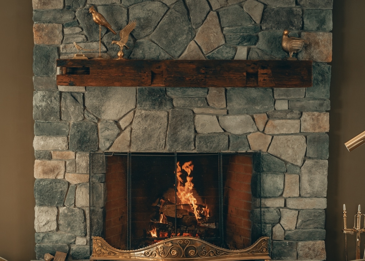 rustic mixed stone fireplace