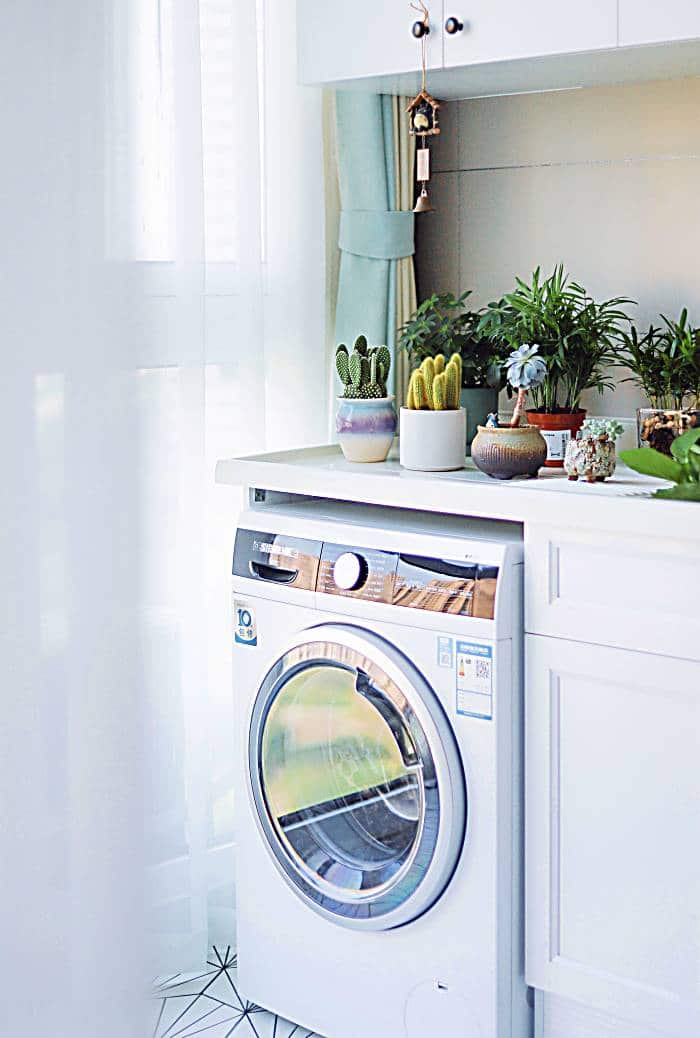 white splashback laundry room washing machine