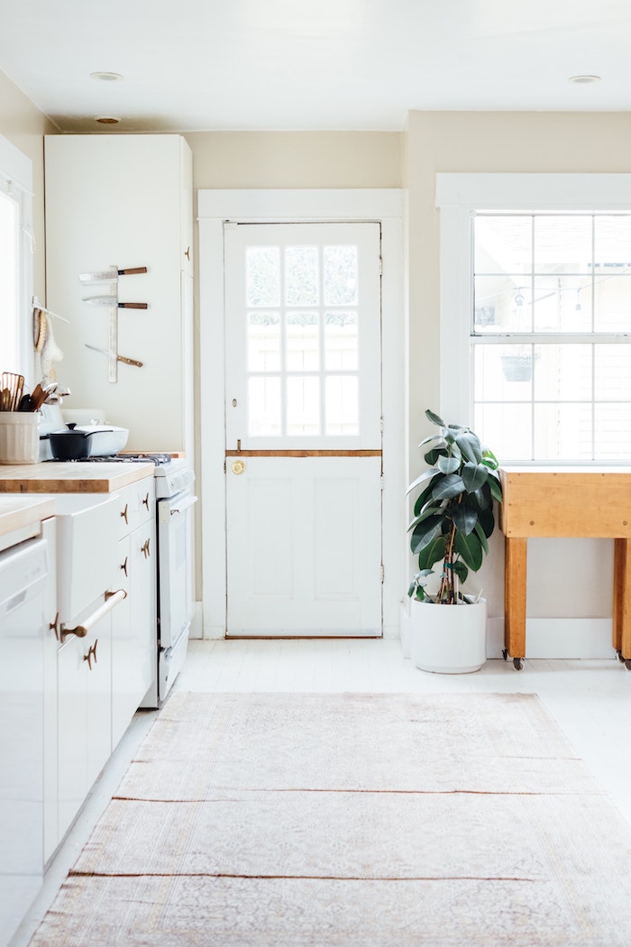 white kitchen farmhouse with door access