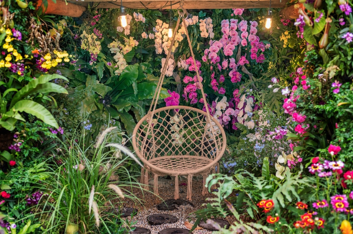 swing basket hanging chair in flower garden