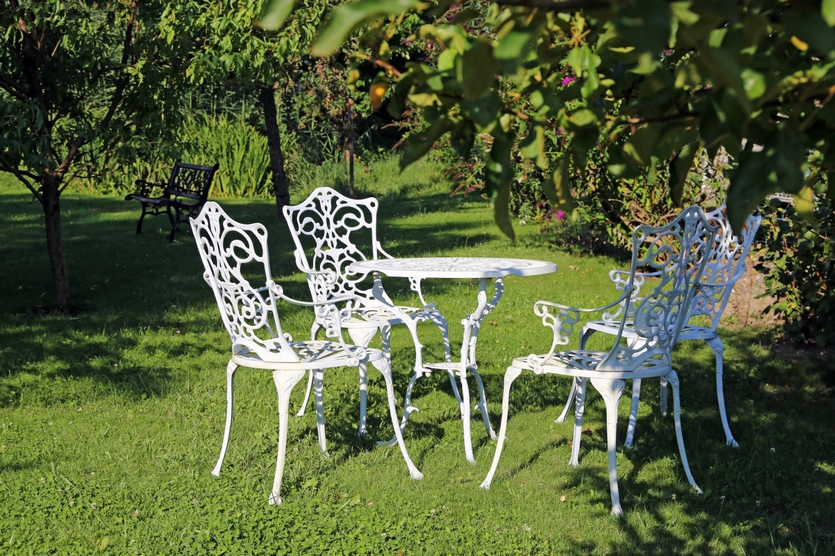 garden with white steel chairs