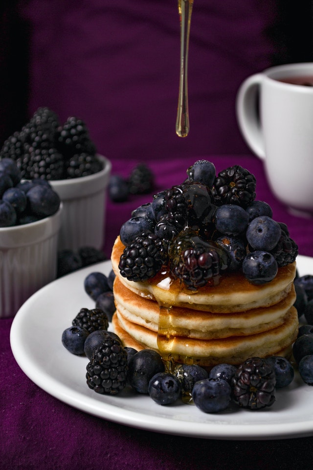 purple bedroom breakfast in bed