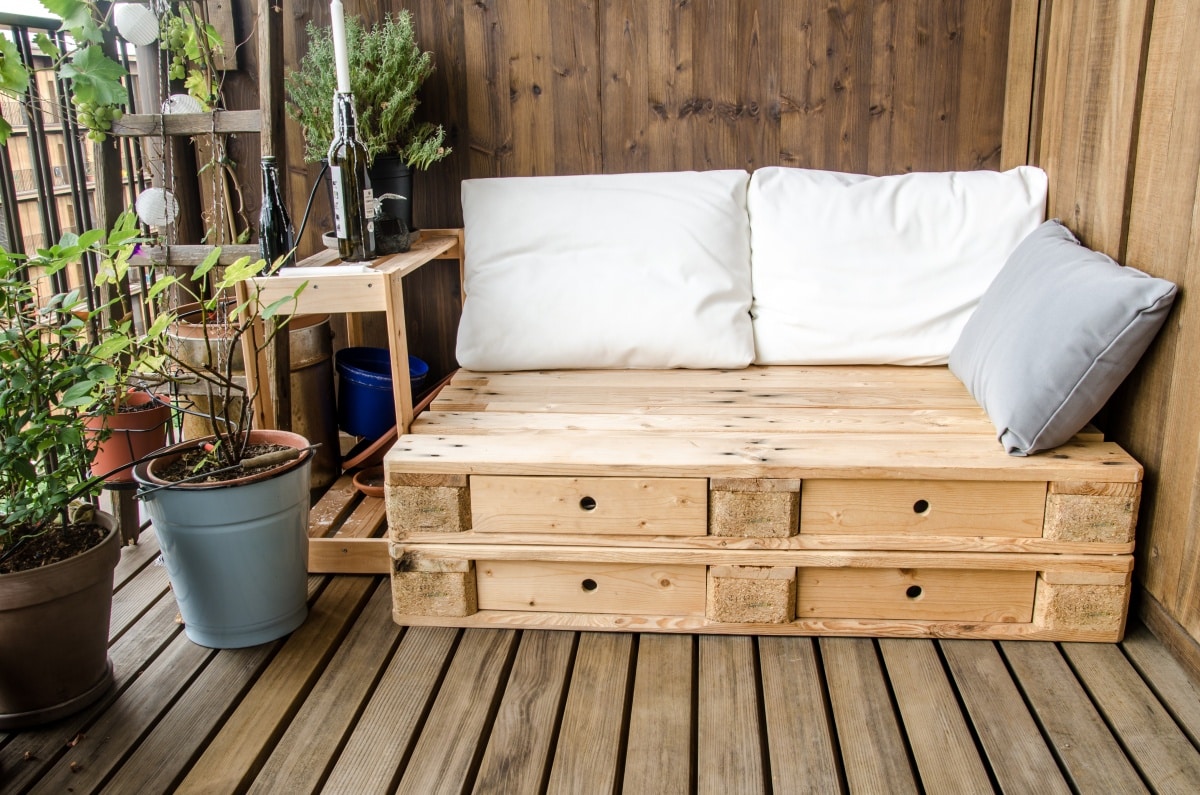 Wooden pallet couch on balcony