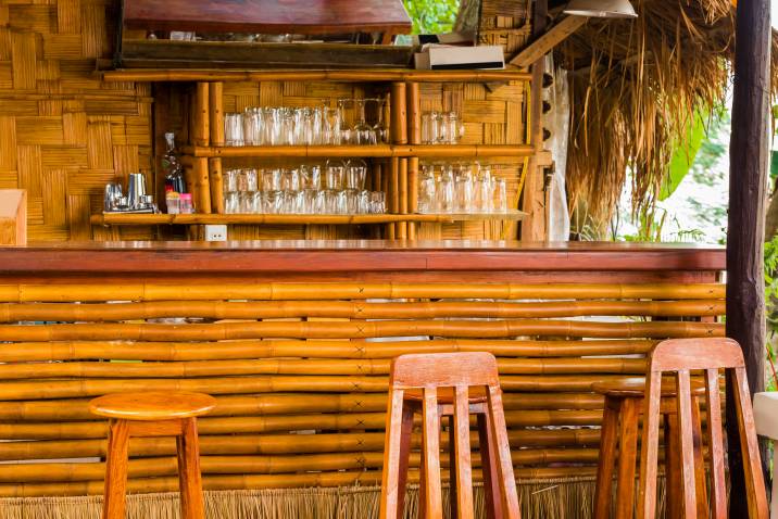bamboo bar with wooden stools