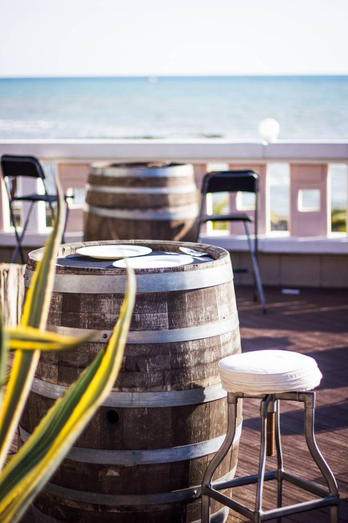 whiskey barrel with bar stools