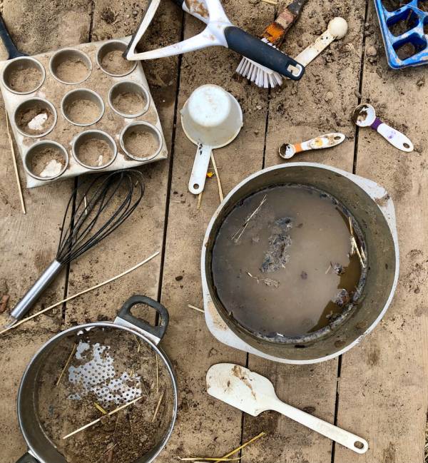 outdoor mud kitchen pots, pans, and utensils