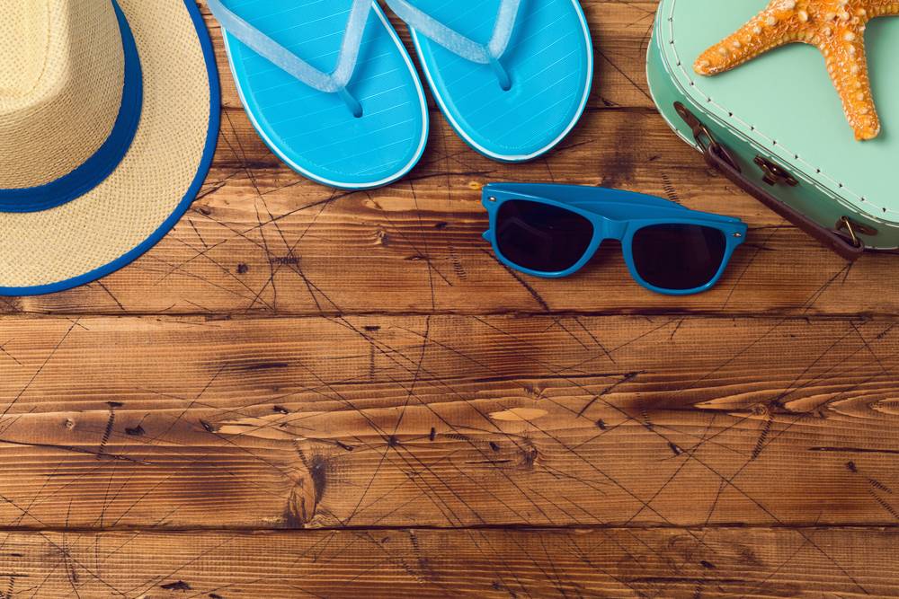 beach accessories on wooden deck