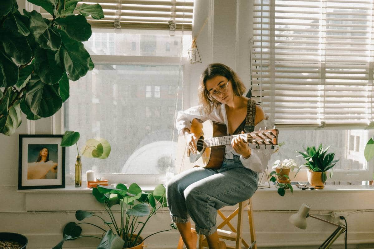 girl playing guitar