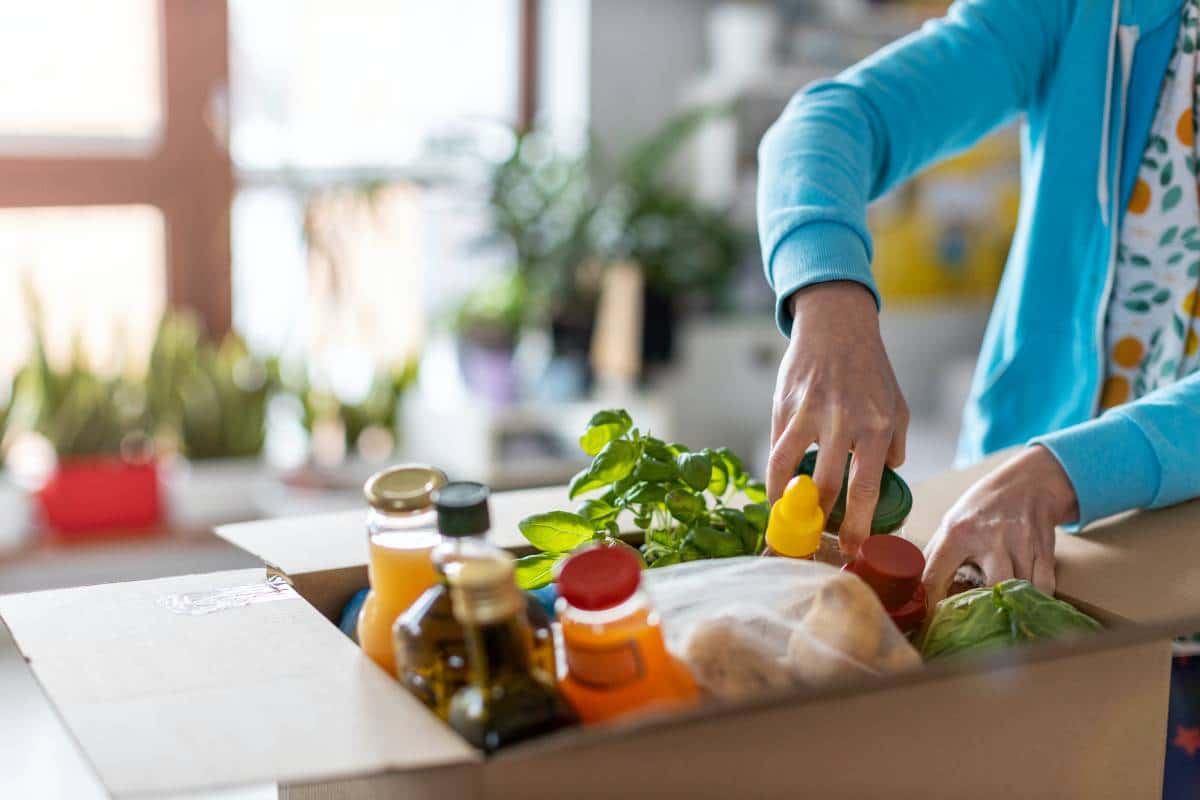 woman unpacking fresh food box