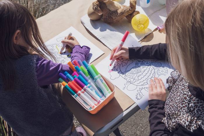 girls colouring with markers