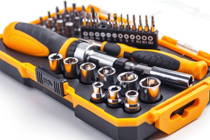 Interchangeable screwdriver set with different types of metal steel heads and bits