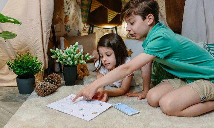 children playing a treasure hunt at home