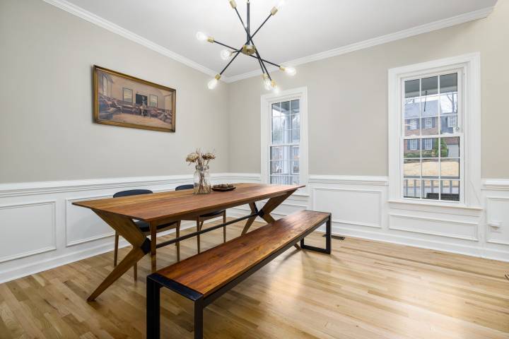 Empty dining room with bench chairs