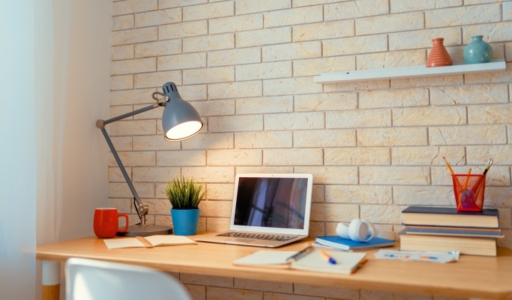 a work space with floating shelves