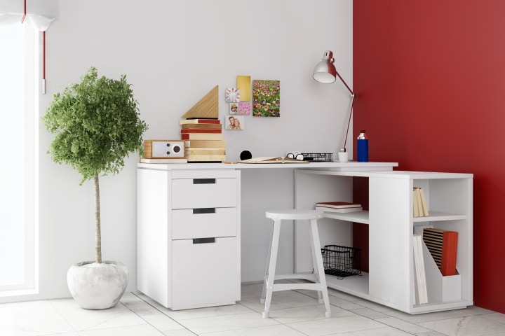 a minimalist office desk with plenty of drawers