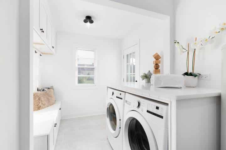 all-white laundry room