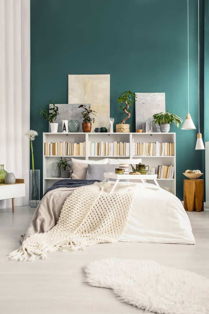bookshelf headboard in bedroom