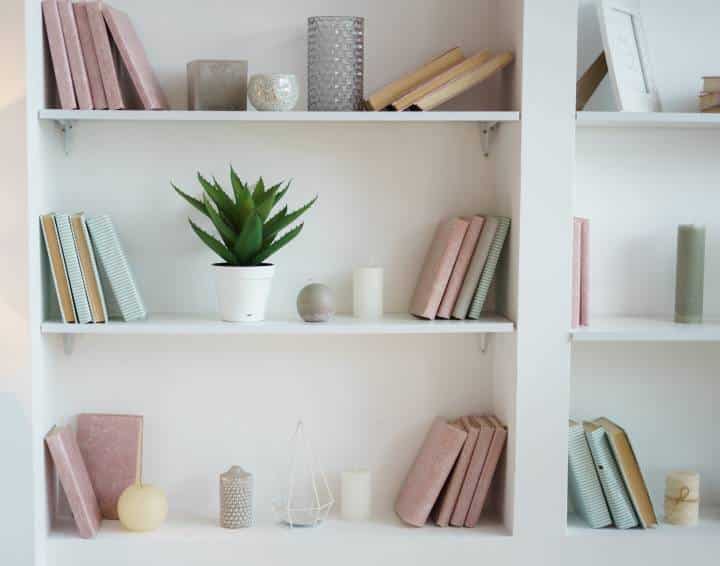 bookcase with pink and blue books